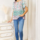 DOUBLE TAKE Floral Tie Neck Short Sleeve Blouse at Bella Road