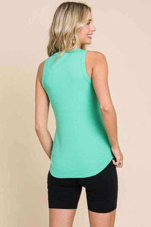 Woman wearing Ribbed Round Neck Tank in mint green, paired with black shorts, showcasing back view