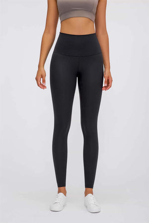 Model wearing Millennia Ultra Soft High Waist Leggings in black, showcasing a comfortable, stretchy fit for athleisure style.