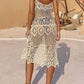 Woman wearing Openwork Scoop Neck Spaghetti Strap Cover-Up Dress, sheer and stretchy, 100% acrylic, back view.