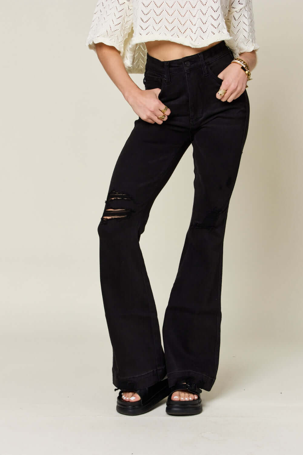 High Waist Distressed Flare Jeans by Judy Blue Jeans - Retro-inspired look with a flattering high waist, edgy distressed details, and vintage flare style.