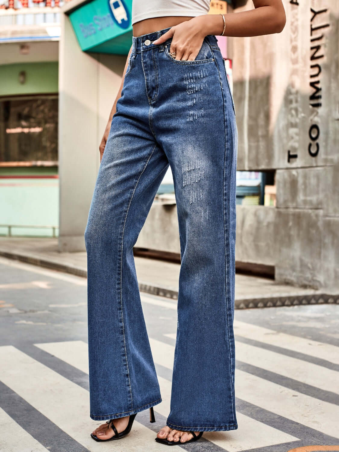 Bella Road High Rise Bootcut Jeans with Pockets, perfect for casual outings, featuring a trendy bootcut and flattering fit.