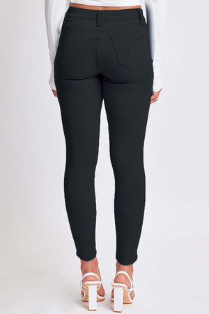 Back view of YMI Jeans Hyperstretch Mid-Rise Skinny Pants in black, showcasing sleek, comfortable fit and versatile style.