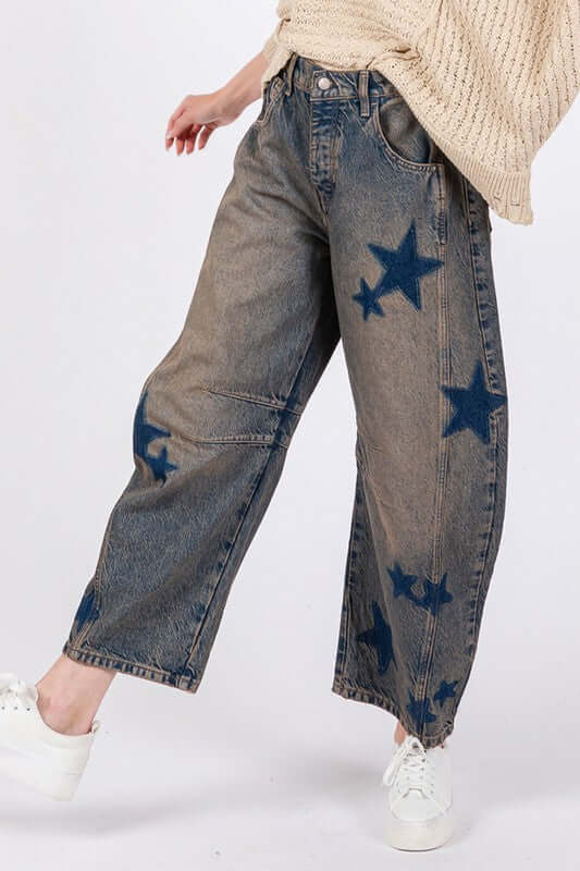 Trendy SAGE + FIG Star Wide Leg Jeans with Pockets, featuring stylish star designs and a comfortable fit.