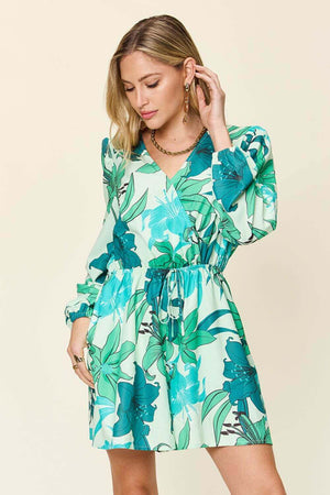 DOUBLE TAKE Full Size Floral Long Sleeve Romper with Pockets at Bella Road