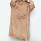 Cozy hooded lounge dress in soft brown fabric, perfect for lounging with large front pocket and relaxed fit.