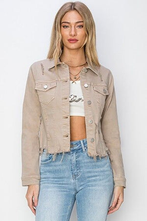 Trendy RISEN cropped denim jacket with raw hem and button-up design, styled for a modern look with distressed details.