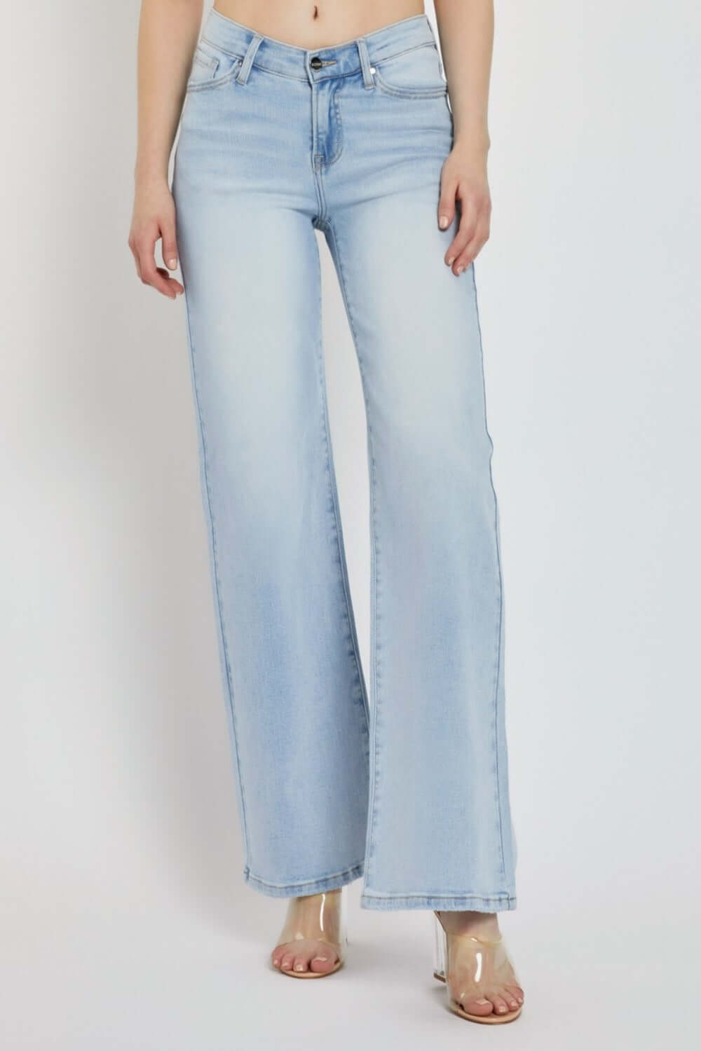 RISEN Full Size Wide Leg V Dipped Front Waist Jeans in light blue, featuring a modern V-dipped front and relaxed fit.