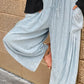 Stylish Bella Road Drawstring Wide Leg Jeans with Pockets in Light Blue, Featuring a Comfortable Fit and Trendy Design.