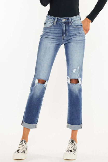 High Waist Distressed Hem Detail Cropped Straight Jeans with rolled cuffs and knee rips, paired with casual printed sneakers.