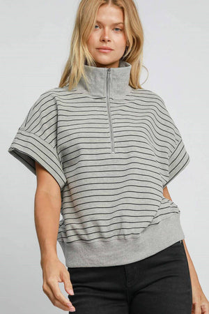 Stylish Umgee striped half zip short sleeve sweatshirt, perfect for spring and summer leisure activities.