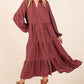 Woman wearing Mittoshop Tiered Button Down Long Sleeve Midi Dress in brown with a stylish, feminine silhouette.