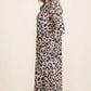 Full-size leopard V-neck long sleeve cardigan, stylishly worn with a flattering silhouette and cozy design.