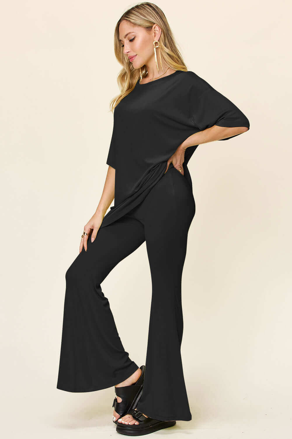 DOUBLE TAKE Full Size Round Neck Drop Shoulder T-Shirt and Flare Pants Set at Bella Road