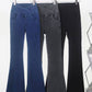 Three pairs of Basic Bae bootcut jeans in blue, gray, and black, showcasing pocketed highly stretchy denim styles.