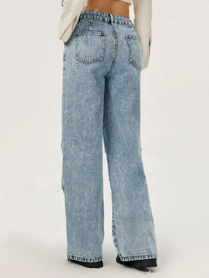 Back view of Bella Road light wash wide leg jeans showcasing trendy pockets and stylish fit.