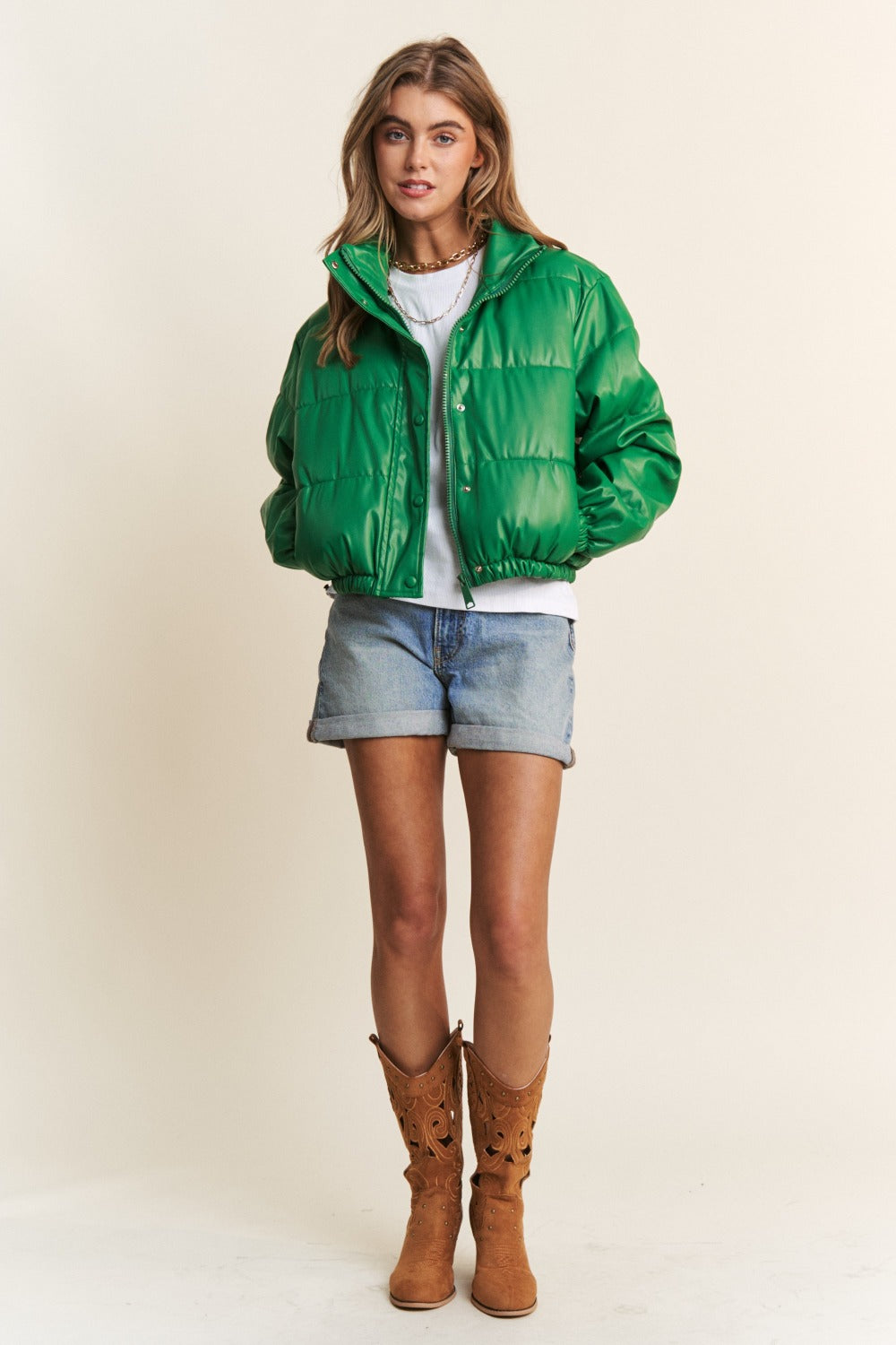 Stylish green J.NNA faux leather turtleneck crop puff jacket with zipper and snap closure, perfect for fall weather.