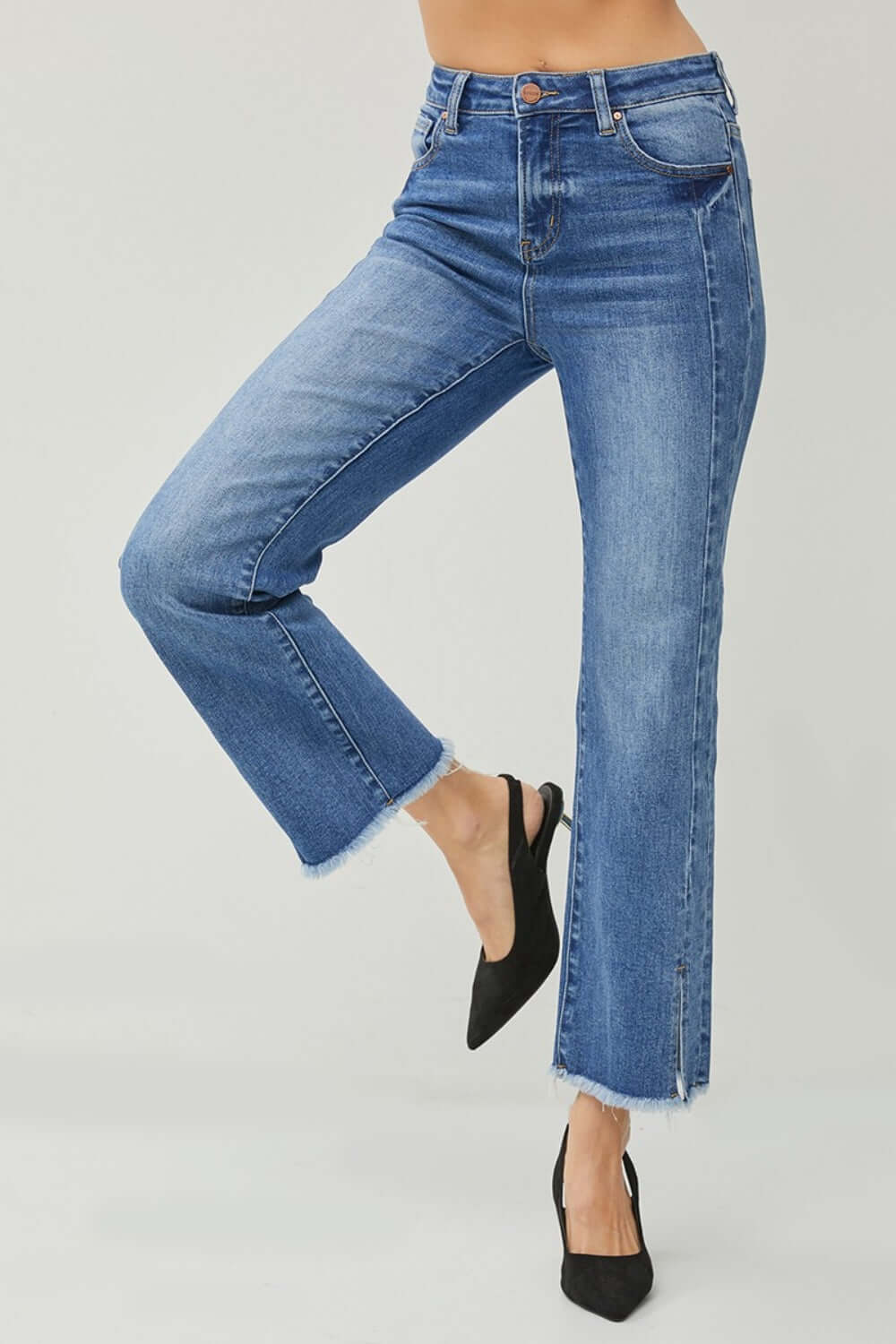 High Waist Raw Hem Slit Straight Jeans by Risen Jeans with a flattering fit, edgy details, and versatile style.