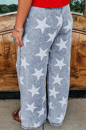 Woman wearing Drawstring Star Wide Leg Jeans featuring playful star print and comfortable drawstring waist for a fun fashion statement