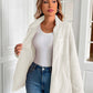 Woman wearing Ivy Lane Zip Up Long Sleeve Fuzzy Jacket in white, showcasing cozy fit and style.