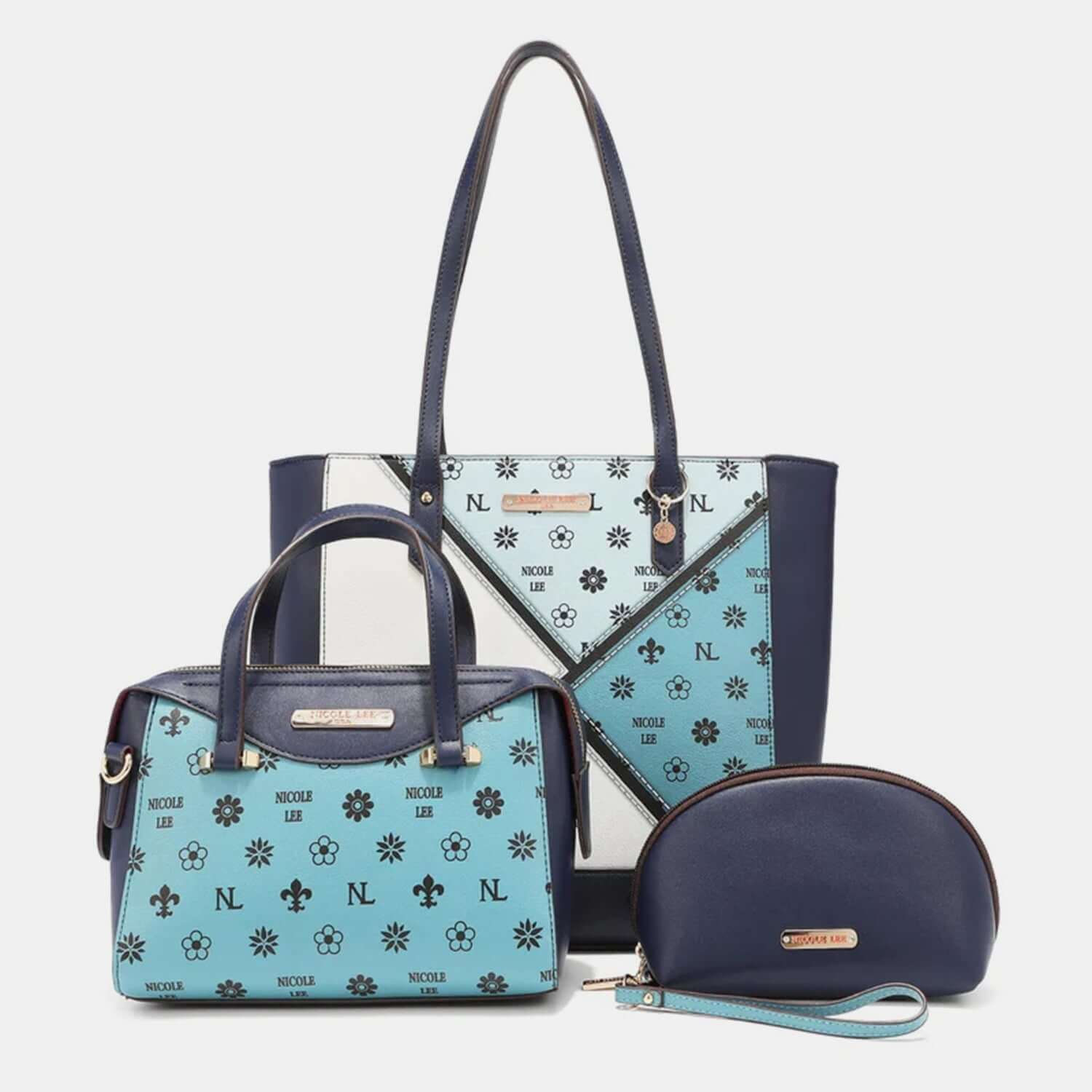 Nicole Lee USA 3-piece color block handbag set, including a stylish shopper, a mini crossbody bag, and a wristlet pouch.