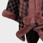 Cozy Bella Road fuzzy checkered poncho in pink and black with soft trim, perfect for stylish fall layering.