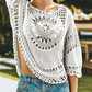 Bella Road Swim Cutout Round Neck Half Sleeve Cover Up in trendy white with intricate details for beach style.