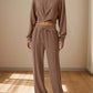 Bella Road Crisscross Round Neck Top and Drawstring Pants Set in brown, perfect for casual outings with friends or date nights.