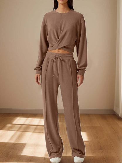 Bella Road Crisscross Round Neck Top and Drawstring Pants Set in brown, perfect for casual outings with friends or date nights.