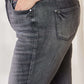 High Waist Tummy Control Release Hem Skinny Jeans by Judy Blue in dark wash, showcasing side pocket and hip detail.