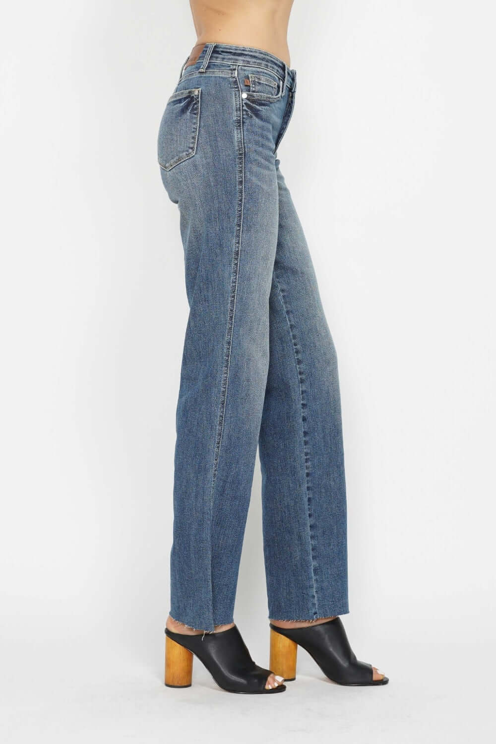 Tummy Control Straight Jeans by Judy Blue Jeans in blue denim, side view, showcasing smooth fit and classic straight leg cut