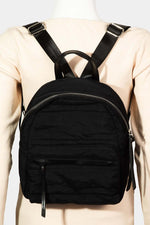 Adjustable strap nylon backpack bag in black, showcasing durable material and stylish design for everyday use.