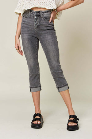 Button fly high waist cuffed capris by Judy Blue Jeans, showcasing a trendy and flattering petite fit with a casual chic vibe.