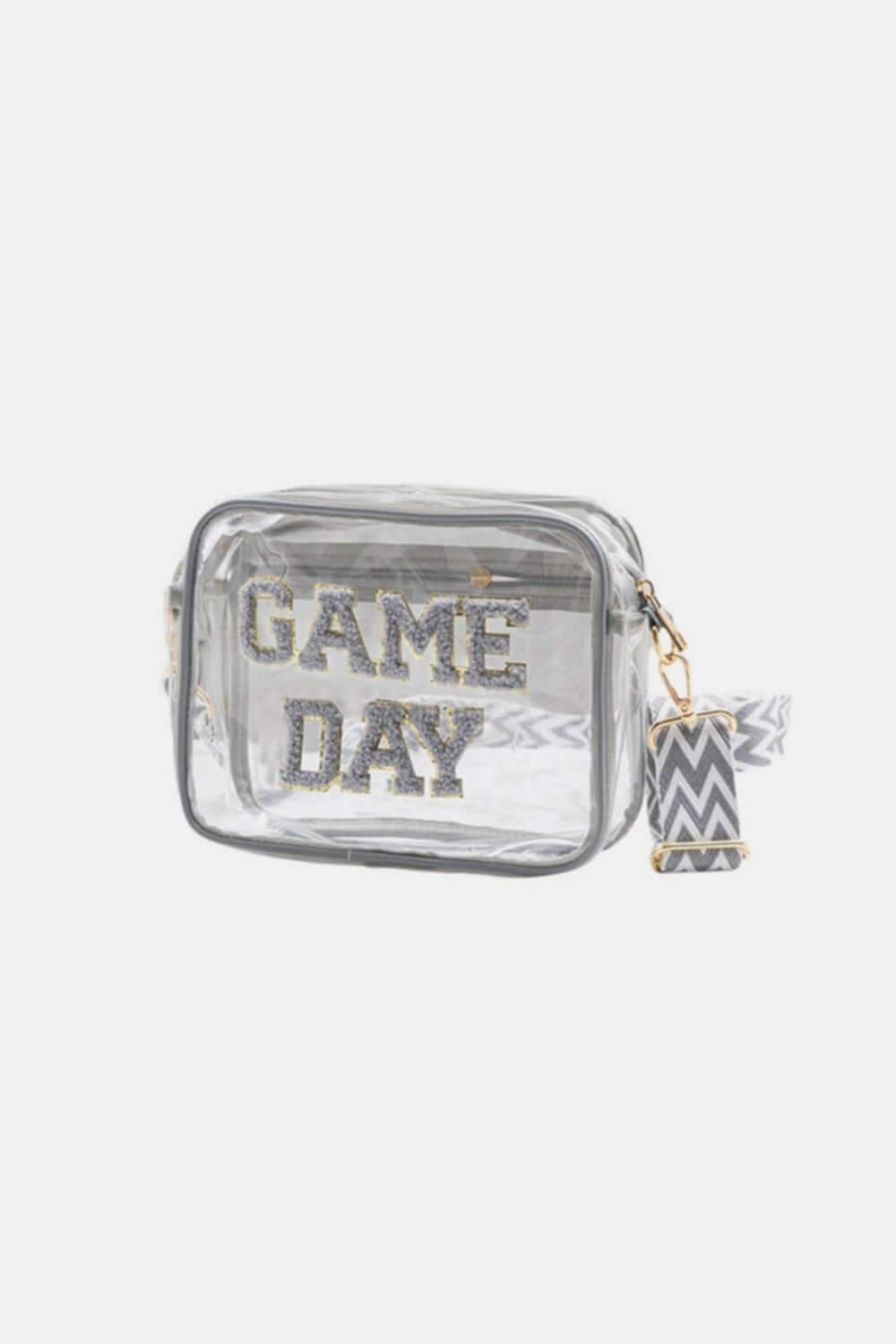 Transparent crossbody bag with "GAME DAY" glitter letters and zigzag strap, perfect for stadiums.