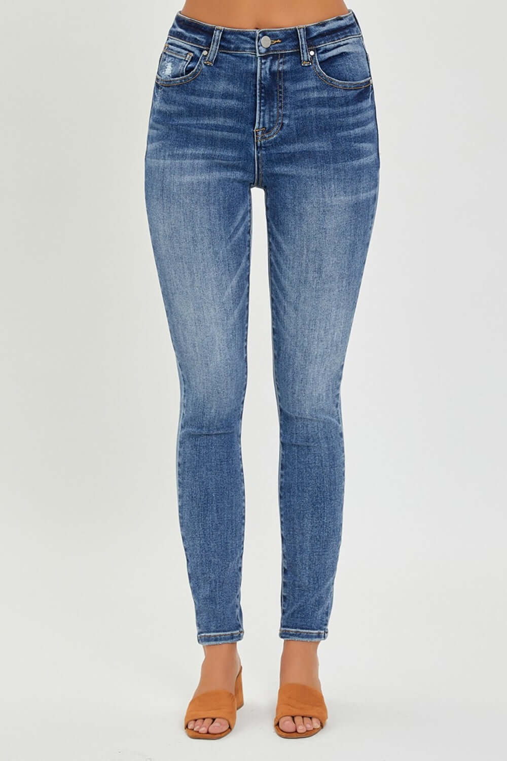 Mid Rise Ankle Skinny Jeans by Risen Jeans showcasing a sleek and stylish silhouette with a comfortable fit and trendy ankle length design.