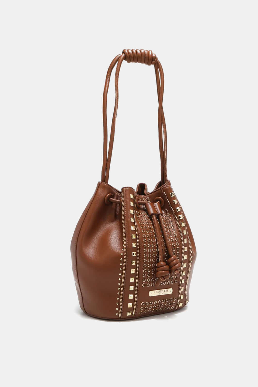 Nicole Lee USA Amy Studded Bucket Bag in vegan leather with stud and zipper details, drawstring closure, and metal feet for durability.