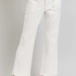 High rise ankle flare jeans with patch pockets in white showcasing retro-inspired silhouette and flattering high-waist fit.