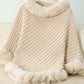 Cozy Bella Road Fuzzy Trim Poncho in soft beige with textured stripes and fluffy trim, perfect for chilly days.