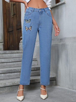 Bella Road Denim straight leg jeans with butterfly embroidery in medium wash, stylish and playful outfit option.