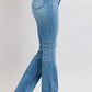 Judy Blue high waist bootcut jeans with side slit in vintage wash, showcasing a flattering fit and stylish silhouette.