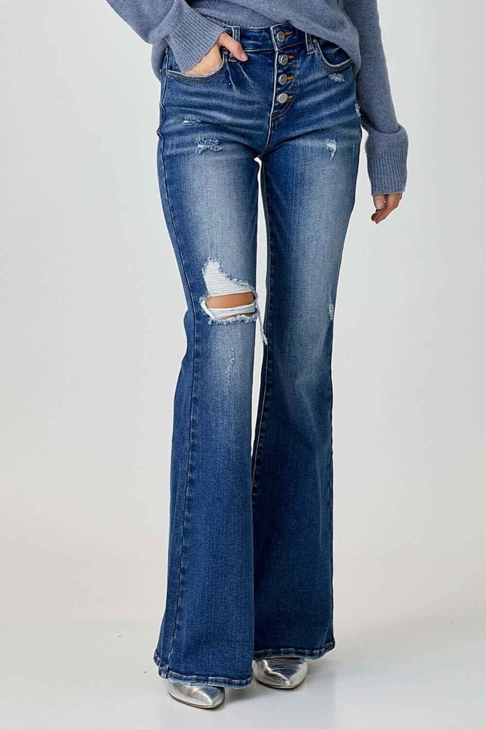 Distressed Button-Fly Flare Jeans by Risen Jeans – Washed Blue Denim, Slight Stretch, Pocketed for Effortless Style and Charm