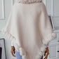 Cozy Bella Road three-quarter sleeve poncho with fuzzy trim, perfect for chilly days and stylish layering.