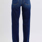 Judy Blue raw hem straight leg jeans, back view showcasing timeless style and versatile fashion in deep blue denim.