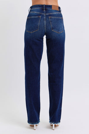 Judy Blue raw hem straight leg jeans, back view showcasing timeless style and versatile fashion in deep blue denim.