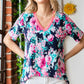 HEIMISH Full Size Floral V-Neck Short Sleeve T-Shirt at Bella Road