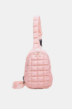 Stylish pink Bella Road Quilted Nylon Crossbody Bag, perfect for trendy adventures, with a sleek design in a medium size.