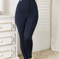 Woman wearing Heimish Full Size Waist Trainer Corset Leggings in a sleek black design, showcasing the extra high rise for a flattering hourglass silhouette