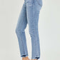 High rise frayed hem skinny jeans by Risen Jeans, showcasing trendy and versatile style with a flattering fit and edgy frayed hem.