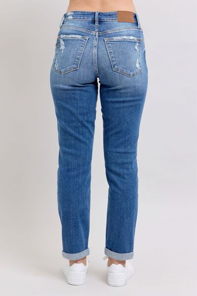 Back view of Judy Blue Plus Size Button Fly Distressed Jeans with Pockets, stylish and slightly stretchy.