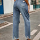 Back view of Bella Road distressed raw hem jeans with pockets, slightly stretchy, made of 95% rayon and 5% polyester.